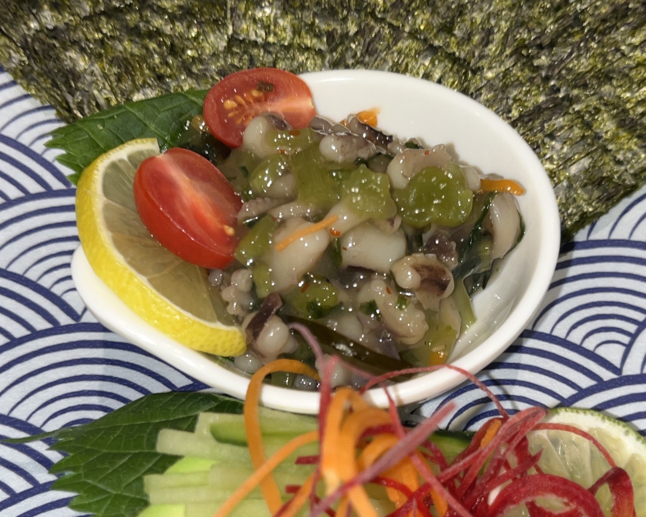  an East Asian dish prepared with immature soybeans in their pods, which are boiled or steamed, and may be served with salt or other condiments. It is consumed in many world regions.